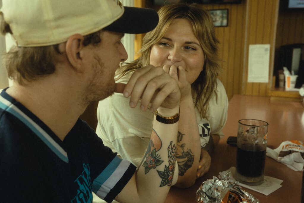 a couple lovingly look at each other in their eyes, during their couples photos