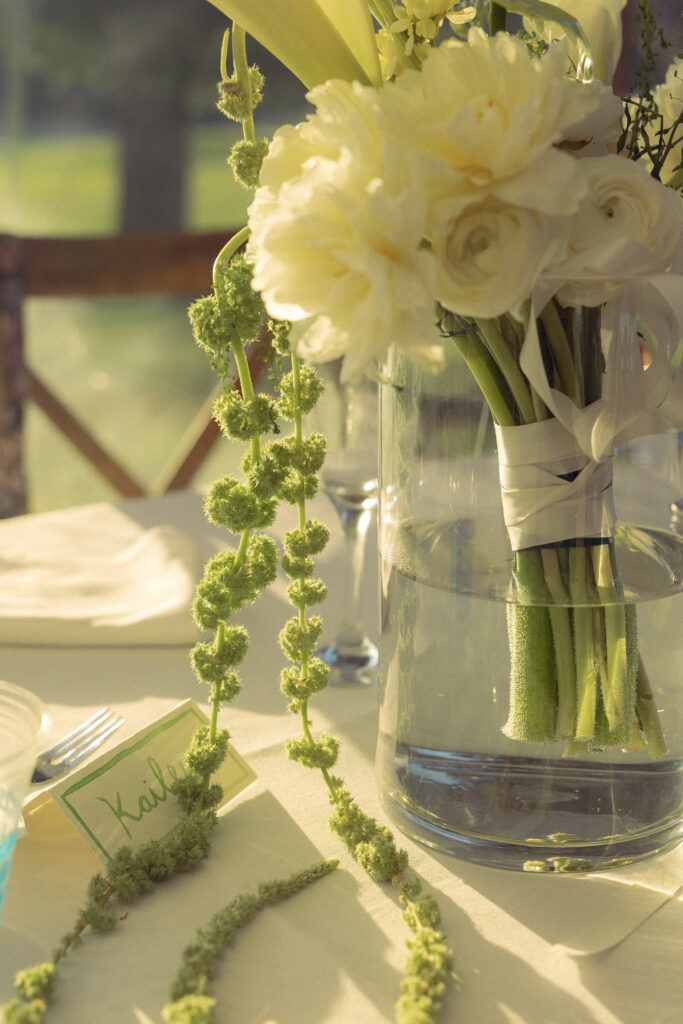 a bouquet sits in a vase of water