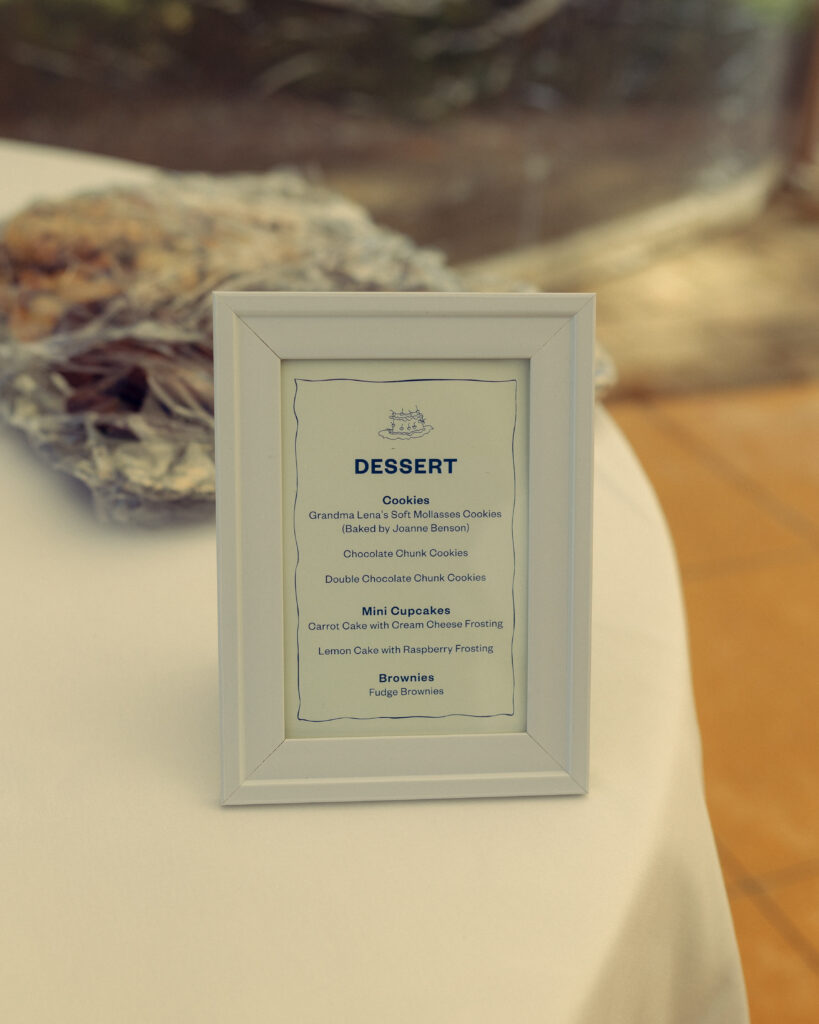 a dessert menu lists cookies and mini cupcakes and brownies for wedding guests