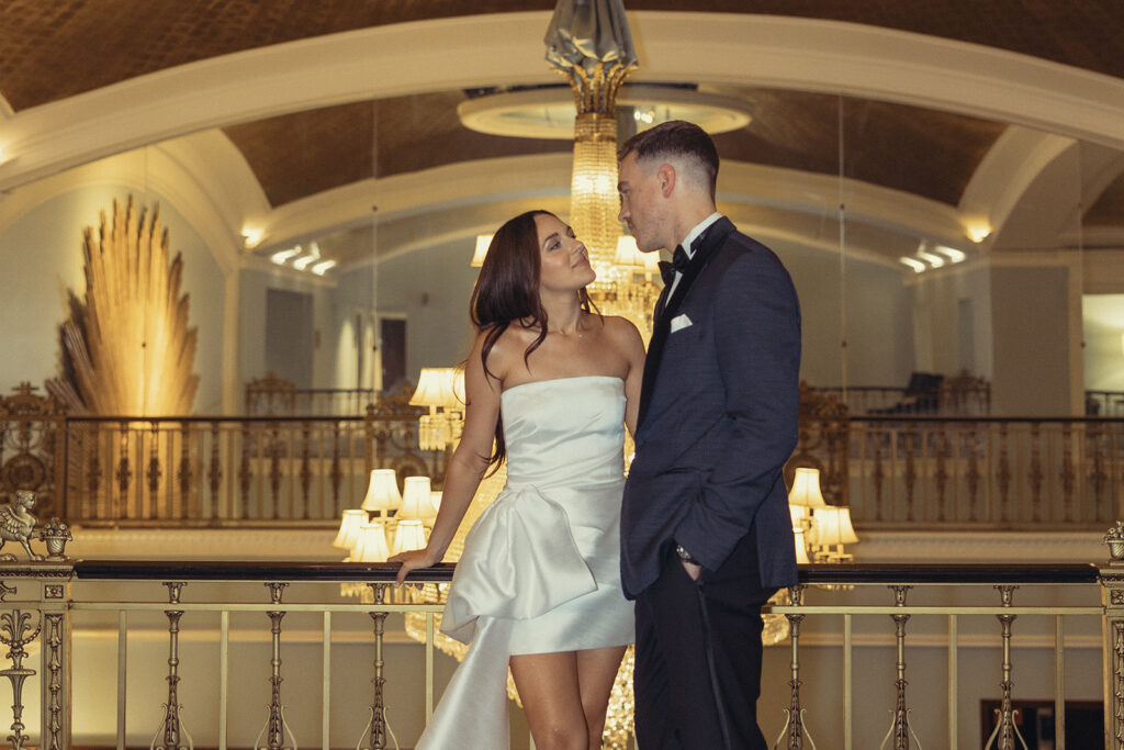 A couple is photographed at the Amway Grand Hotel on their wedding day, one of the hotel wedding venues grand rapids MI