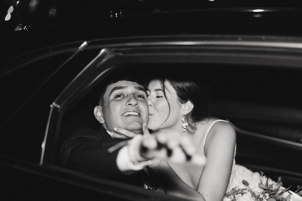 A black and white image of a Michigan couple on their big day as part of a guide to wedding venues in grand rapids