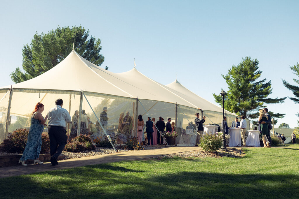 A reception tent is displayed at outdoor wedding venues grand rapids