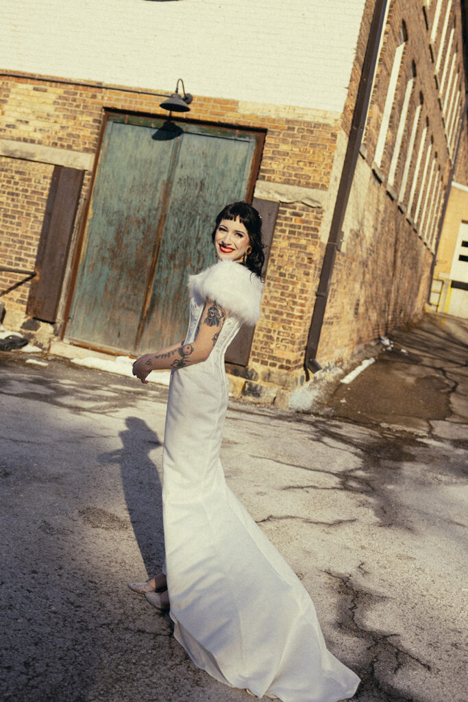 A bride in Battle Creek, MI poses for bridal portraits in her wedding dress before her battle creek wedding