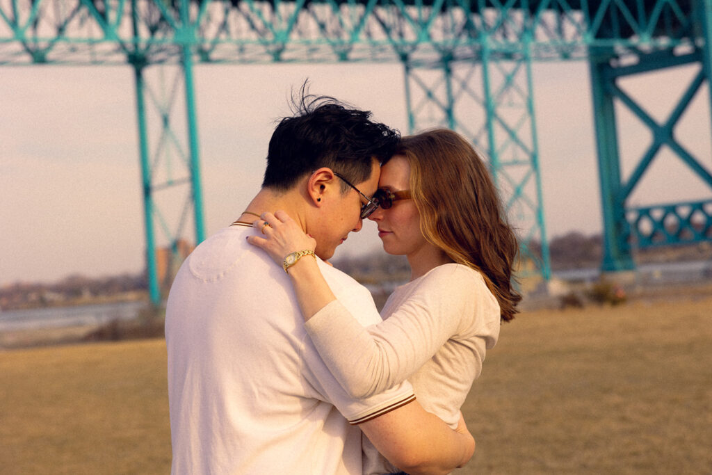 Detroit downtown pictures from an engagement session by the Ambassador Bridge 