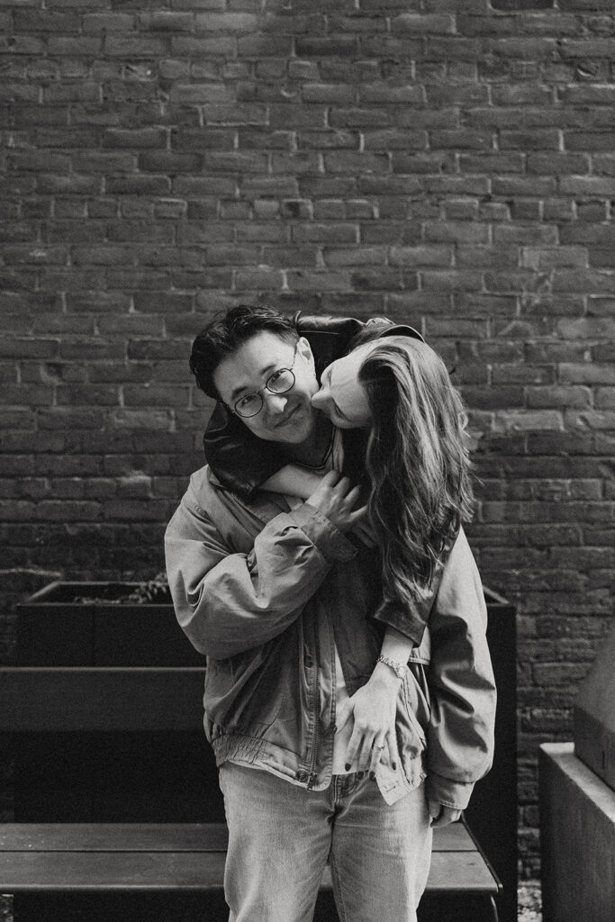 A black and white image of a couple taken by Detroit engagement photographer Anika B Photography 
